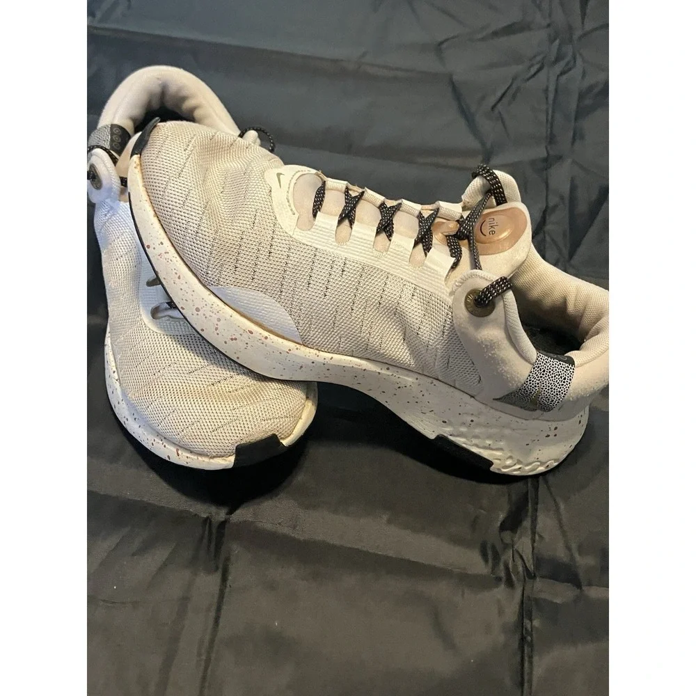Nike Renew Serenity Run Premium Womens US 8 Sail Metallic Copper Coin Colorway